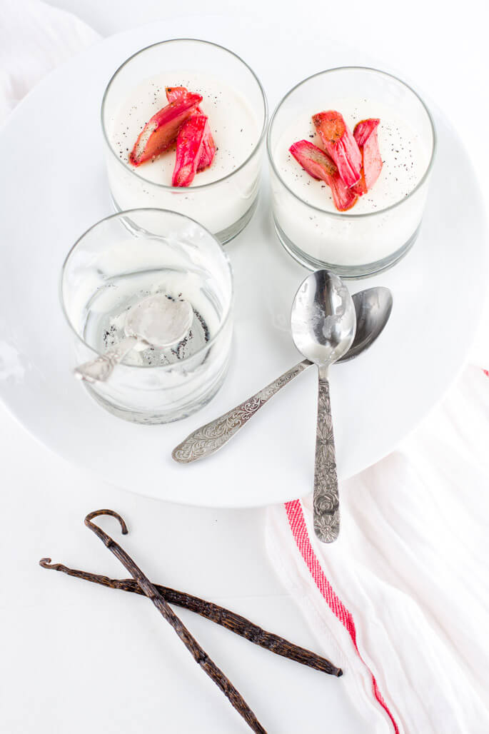 Vanilla panna cotta with roasted rhubarb is an elegant, refreshing, quick & easy dessert. Ideal for summer. Luxurious, remarkable creamy, melt in your mouth panna cotta paired with the sweet and sour roasted rhubarb is a PURE PLEASURE.