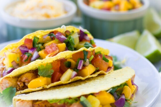 Quick and easy Mahi-mahi fish tacos with pineapple mango salsa recipe to enjoy with friends and family. Vibrant, festive, delicious dinner to brighten your day. Perfect substitution for a take-out on a lazy weekend. So COLORFUL and YUMMY!