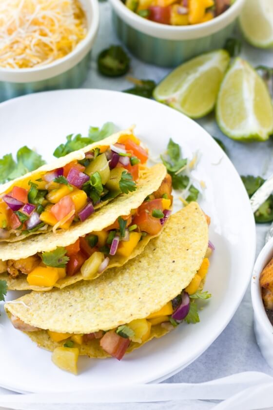 Quick and easy Mahi-mahi fish tacos with pineapple mango salsa recipe to enjoy with friends and family. Vibrant, festive, delicious dinner to brighten your day. Perfect substitution for a take-out on a lazy weekend. So COLORFUL and YUMMY!