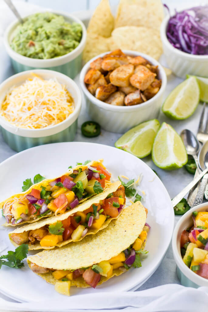 Quick and easy Mahi-mahi fish tacos with pineapple mango salsa recipe to enjoy with friends and family. Vibrant, festive, delicious dinner to brighten your day. Perfect substitution for a take-out on a lazy weekend. So COLORFUL and YUMMY!