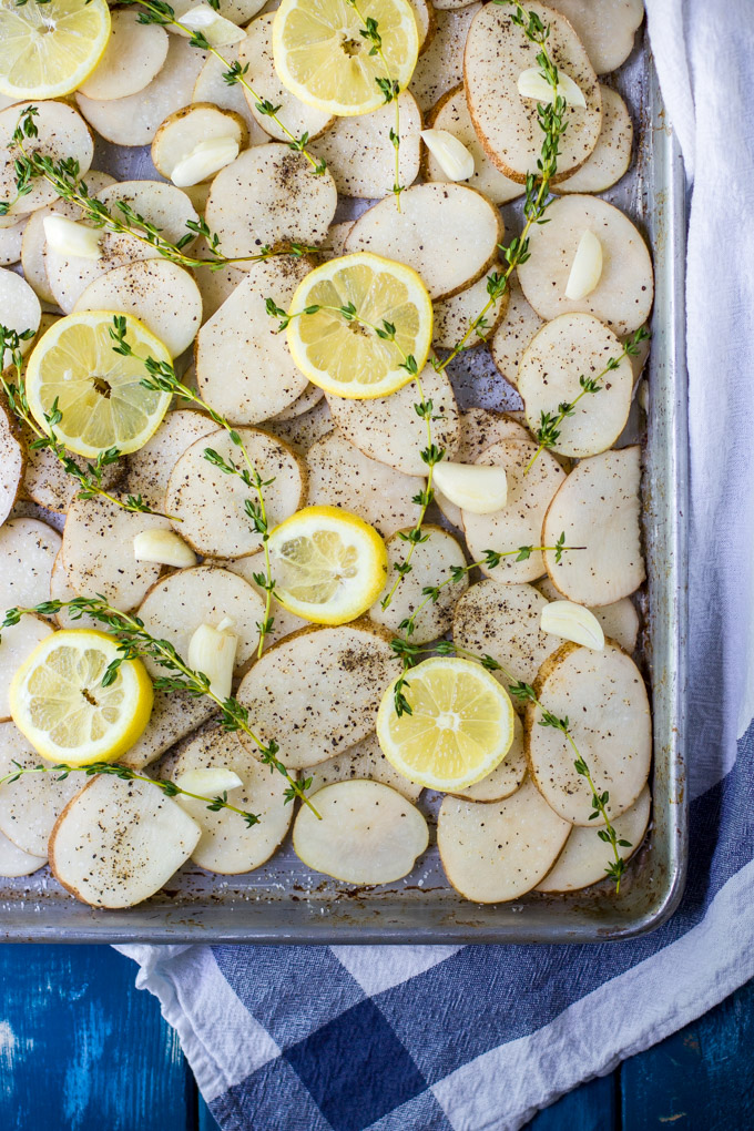 Roasted chicken legs with lemon and potatoes recipe. Thyme and lemon brings a lot of fresh aroma and taste into this simple, delicious dish. For busy rough days just add a glass of wine and enjoy this rustic comfort dinner to the fullest. Bon Apetit!