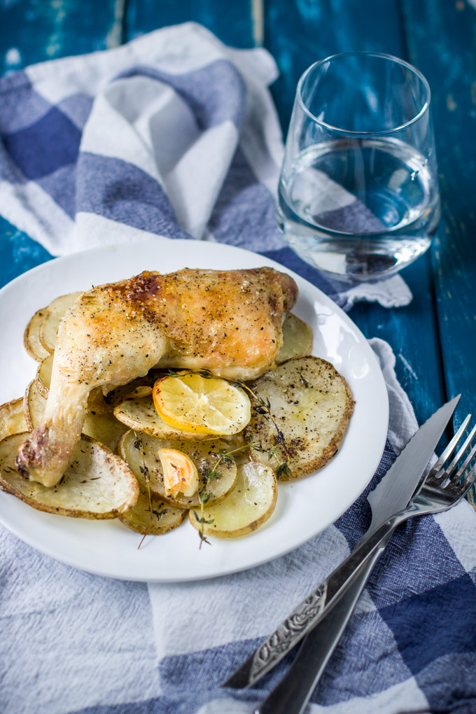 Roasted chicken legs with lemon and potatoes