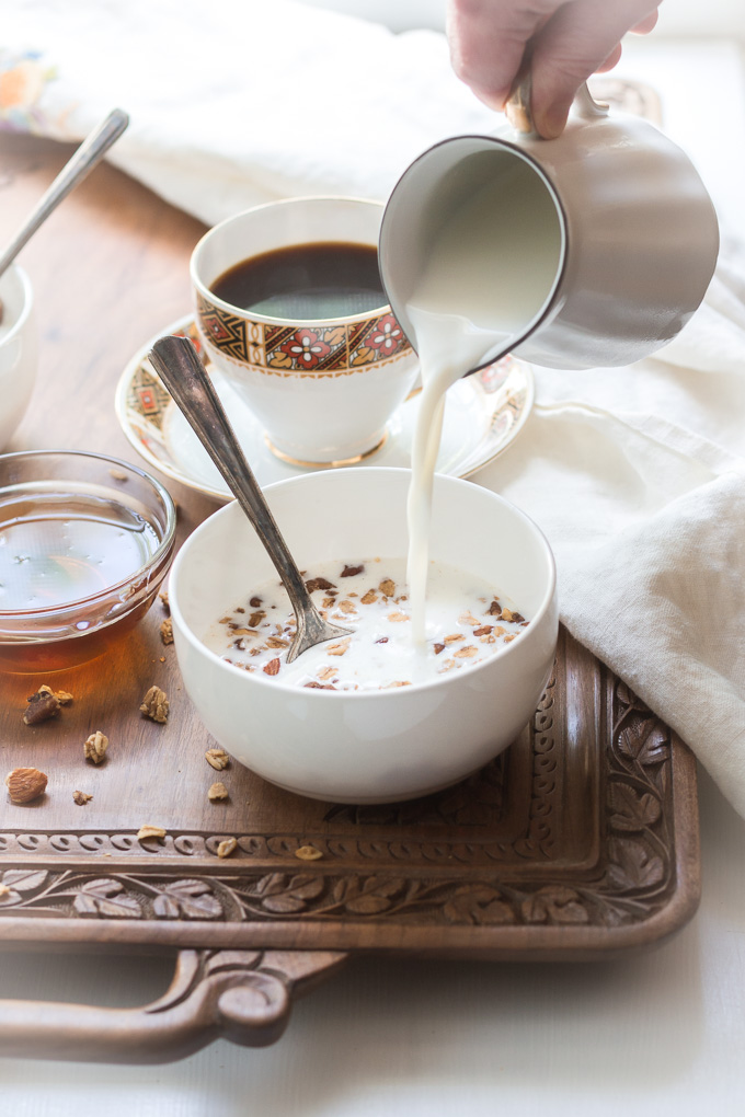 Homemade coffee granola with winter spices is the perfect way to start your day. This granola is like eating a slice of a gingerbread with the cup of freshly brewed coffee, but a lot healthier.