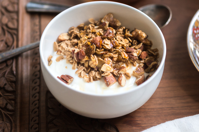 Homemade coffee granola with winter spices is the perfect way to start your day. This granola is like eating a slice of a gingerbread with the cup of freshly brewed coffee, but a lot healthier.