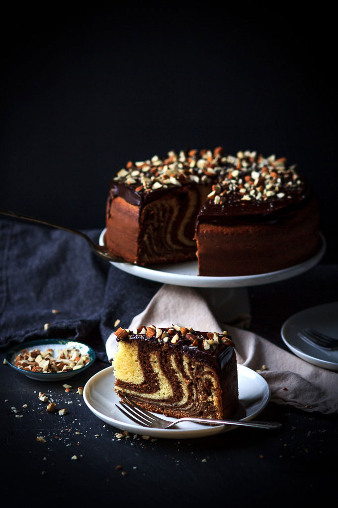 A very simple, yet sophisticated Zebra cake with chocolate glazing recipe. With very little efforts, in 1 ½ hours, you will get the airy textured cake with vanilla, and chocolate aroma and melt in your mouth chocolate glazing.