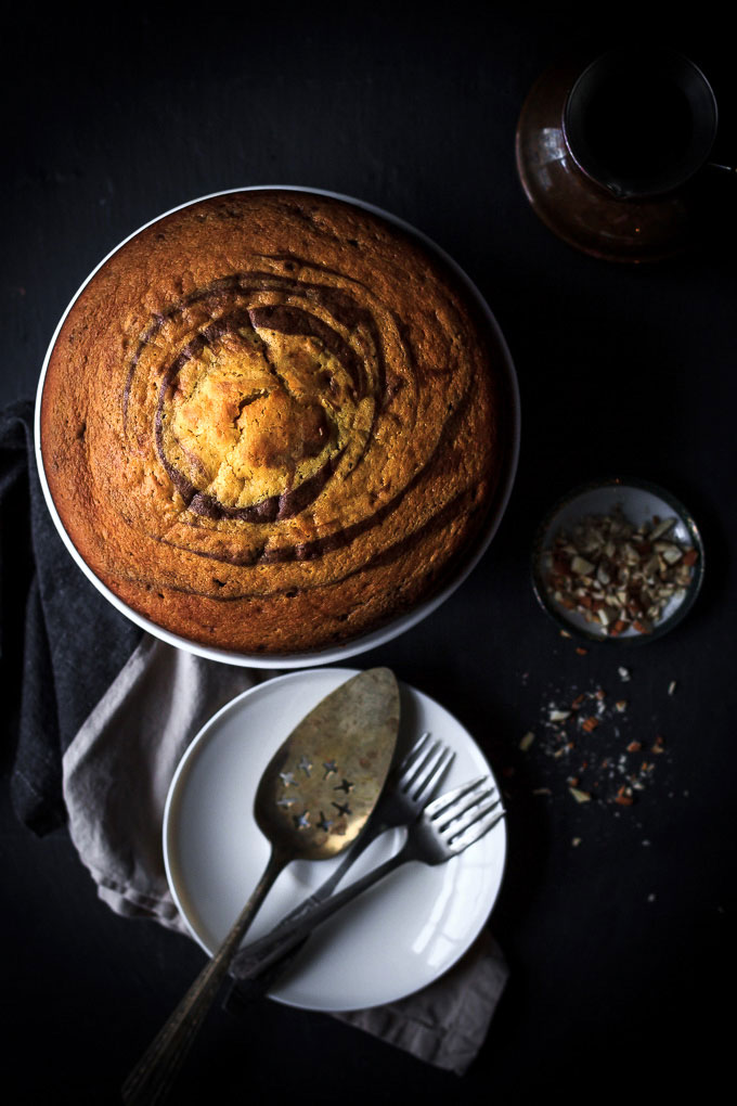 A very simple, yet sophisticated Zebra cake with chocolate glazing recipe. With very little efforts, in 1 ½ hours, you will get the airy textured cake with vanilla, and chocolate aroma and melt in your mouth chocolate glazing.