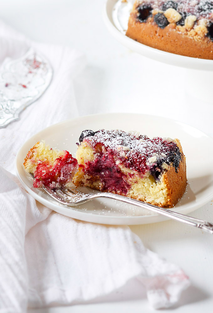 This effortless mixed berry cake recipe is perfect for any occasion or when you need a little extra cheer me up treat. Super easy and fast to make, AND low on sugar. The delicate sweet and tangy taste, the melt in your mouth buttery texture, and the pop of different colors are worth your time.