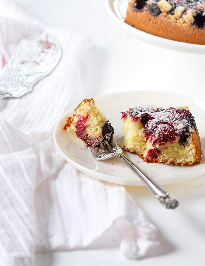 This effortless mixed berry cake recipe is perfect for any occasion or when you need a little extra cheer me up treat. Super easy and fast to make, AND low on sugar. The delicate sweet and tangy taste, the melt in your mouth buttery texture, and the pop of different colors are worth your time.