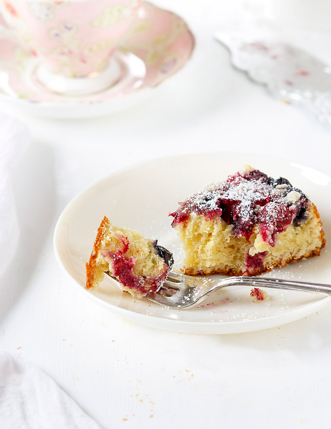 This effortless mixed berry cake recipe is perfect for any occasion or when you need a little extra cheer me up treat. Super easy and fast to make, AND low on sugar. The delicate sweet and tangy taste, the melt in your mouth buttery texture, and the pop of different colors are worth your time.