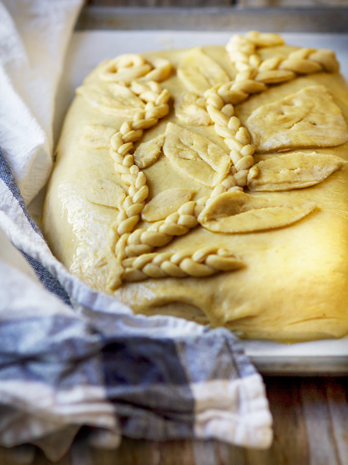 This Ukrainian savory egg and fresh herbs pie is a family recipe and one of my favorite pies from the childhood. The combination of fresh eggs from a local farm and fragrant seasonal dill, parsley and scallions wrapped in a soft, lightly sweetened yeasted dough will make you fall in love with this recipe.