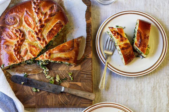 This Ukrainian savory egg and fresh herbs pie is a family recipe and one of my favorite pies from the childhood. The combination of fresh eggs from a local farm and fragrant seasonal dill, parsley and scallions wrapped in a soft, lightly sweetened yeasted dough will make you fall in love with this recipe.