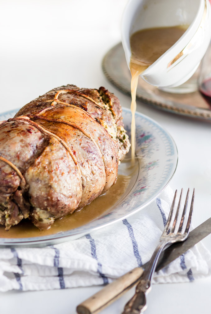 This fresh herbs and feta cheese stuffed leg of lamb recipe is a stunning way to impress your guests. Prep the lamb a day ahead so it will absorb all the aromas from the filling. Cook it the next day and enjoy it with friends and family. A go-to recipe for a stunning meat main dish for any special occasion.