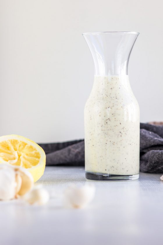 A healthy Greek Yoghurt Dressing. It is entirely free of mayo, packed with nutritious ingredients, and can be used as salad dressing. With a few pulses in your food processor, you have a healthy dressing to enjoy with sandwiches or salads. #dressing #greekyogurtdressing