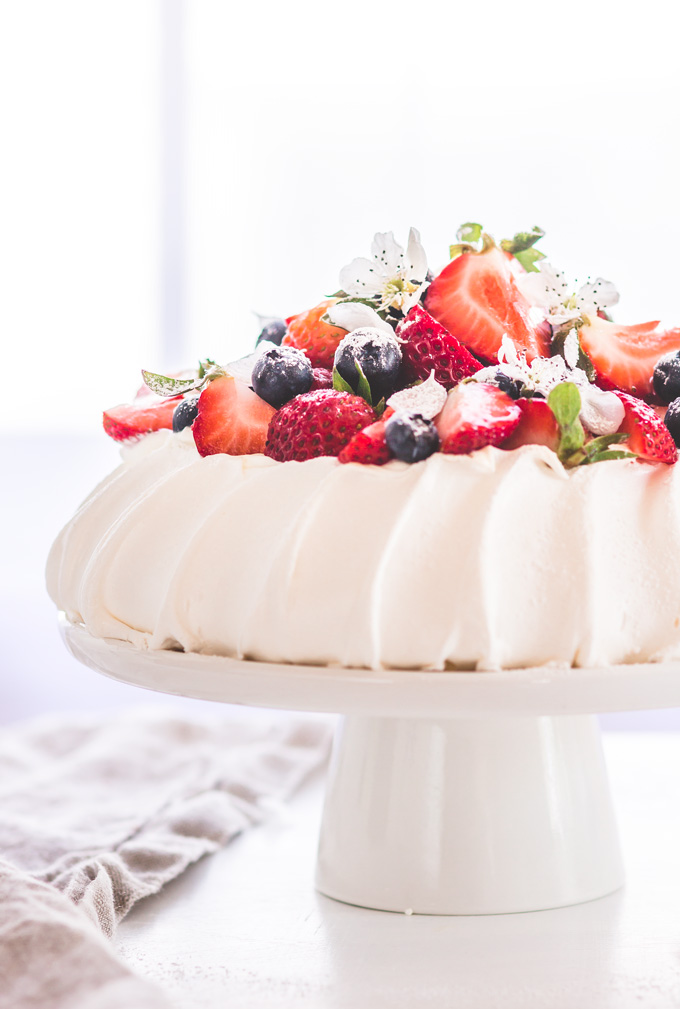 In this post, you will learn how to make one of the most famous and beloved Australian or New Zealand authentic pavlova cake After many trials and errors, I’m proud of the result and exciting that I finally conquered classic pavlova dessert! Now I’m ready to share with you all secrets, tips, and tricks that will help you make this fantastic dessert! #pavlova #pavlovarecipe #pavlovadessert #pavlovacake