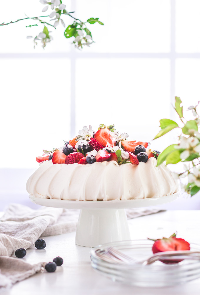 Delicious Pavlova Cake With Cream, Berries Thyme And New Zealand Flag Over  Dark Background. Space For Text. Selective Focus Stock Photo, Picture and  Royalty Free Image. Image 77407515.