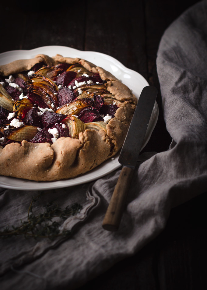 This rustic roasted beets and goat cheese galette will prove that beets can be delicious and fancy. In this recipe, you will learn how to cook beets the right way, how to make 100% white whole wheat crust and how to use the underdog vegetable to create the beautiful savory galette. If you are looking for the beets recipe, then give this beet and goat cheese pie – galette a chance. #pie #galette #beets #savory #goatcheese